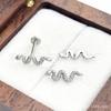 Uña de labio de titanio G23 en forma de serpiente, piercing para oreja, piercing para lengua, piercing para cartílago de la oreja. La aleación de titanio se puede anodizar