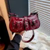Bolso de Motocicleta de Cuero Patentado de Alta Gama de Comercio Exterior 2026 Nuevo Bolso de Hombro Único Retro Moda Europea y Americana Bolso Cruzado de Temperamento Moderno para Mujer