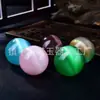 Venda Direta da Fábrica: Bola de Mão Pedra Olho de Gato, Ornamento de Bola de Cristal Colorida, Bola da Fortuna, Artesanato de Bola de Mão Pedra Sete Estrelas