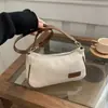 2025 Bolsa de Ombro Portátil Leve Cor Sólida Casual Versátil Bolsa de Axila Ondulada Simples para o Dia a Dia Bolsa de Mão Bolsa Feminina