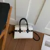 Bolso de Mano Retro de Gama Alta para Mujer 2026 Primavera Nuevo Estilo Bolso Cuadrado Pequeño Simple Versátil Moda Bolso de Hombro Cruzado