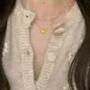 Colar Vintage Coração Dourado Escovado Estilo Coreano e Japonês para Mulheres, Corrente de Clavícula Exquisita Versátil de Luxo Leve de Nicho de Alta Qualidade