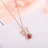 Otoño e invierno Nuevo collar de ratón del zodiaco en oro para mujer, personalidad, moda, colgante de granate rojo incrustado, cadena para la clavícula, venta al por mayor