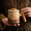 Nueva taza de cerámica estilo chino Dunhuang de nueve colores con ciervo y tapa, taza de oficina, taza de agua, taza de té de lujo de alta gama