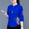 Camiseta de moda de manga tres cuartos suelta con cuello redondo y estampado para mujer, talla grande, adelgazante, top estampado