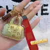 Estilo Popular, Garantizado para Hacerte Rico, Llavero, Diseño de Cuerda a Cuadros, Forma de Mini Bolso, Versátil, Regalo para Amigos y Colegas, Venta Directa de Fábrica
