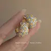 Aretes de Flor Gota de Aceite de Aguja de Plata Simples Dulces Frescos de Botón Versátiles Moda Elegantes Pendientes al por Mayor para Mujeres