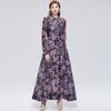 Foto Real de un Vestido Estampado de Alta Gama Estilo Francés con Cuello Alto, Mangas Largas, Cintura Ceñida y Falda Evasé, Viene con un Top sin Tirantes