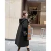 Abrigo de Lana de Moda Británica para Mujer 2026 Nuevo Estilo Otoño e Invierno Abrigo de Lana Versátil con Capucha de Longitud Media