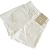 Shorts de mezclilla blancos versátiles de verano finos para personas petite, nuevos shorts de pierna ancha de talle alto adelgazantes 2026