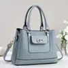 Bolso tejido para mujer nuevo, alto valor estético, moda macarrón, bolso de mano versátil transfronterizo, bolso de hombro y bandolera, disponible para dropshipping