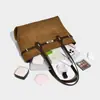 Bolsa Tote de Design de Nicho para Mulheres 2025 Nova Bolsa de Ombro Único Transversal Retro Moda Grande Capacidade Bolsa de Axila para o Dia a Dia