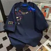 Camiseta de Verano Nueva de Manga Corta para Mujer con Estampado Floral de Letras Divertido y Elegante, Marca de Moda, Corte Holgado, Top Estilo Universitario