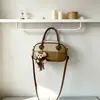 Bolsa tote balde de alta qualidade com textura e cor contrastante, estilo moderno, feminina, nova moda 2026, versátil para o dia a dia, bolsa transversal pequena