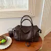 Bolso de mano retro de lujo ligero transfronterizo para mujer, nuevo bolso de moda 2026 verano con tachuelas para el día a día, bolso de hombro y cruzado