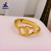 Anillo doble de amor al por mayor chapado en oro latón, chapado al vacío, joyería de imitación de oro directo de fábrica, anillo de dedo vivo para damas