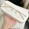 Nuevo y elegante armazón de anteojos sin montura de titanio puro con borde cortado, popular armazón de anteojos semi-titanio ultraligero, anti-luz azul, apto para lentes de prescripción