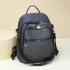 Coleção de outono 2026 transfronteiriça: mochila feminina, estilo coreano, versátil, fashion, moderna e casual estilo europeu e americano
