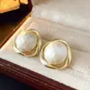 Pendientes de Perla con Aguja de Plata S925 Diseño Retro de Nicho Femenino Sentido de Diseño Súper Hada Temperamento Pendientes Circulares Geométricos Simples