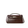 Elegante bolso de mano con patrón de cocodrilo para mujer, nuevo bolso Kelly de cuero encerado al aceite vintage 2026, bolso cruzado texturizado de otoño e invierno
