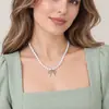 Collar con lazo de perlas de mijo estilo francés para mujer, de lujo, suave y ligero, con cadena de clavícula apilada de doble capa, diseño de nicho