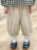 Otoño 2024 nueva ropa infantil coreana para niñas, camisa tipo muñeca de cuadros con volantes y cuello de encaje, pantalones de algodón