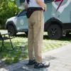 Primavera/Verão 2025 Secagem Rápida Três-Resistentes Estilo Japonês Leve Fresco Casual Calças Roupa de Trabalho Cintura Elástica Pequeno Logo Triangular Estilo Outdoor Americano