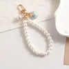 Nuevo Cordón para Teléfono Móvil Pulsera de Perlas con Lazo para Mujer Ins Moda Simple Boutique Aroma Pequeño Cuentas Hechas a Mano