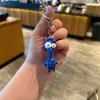 Llavero de jirafa con ojos grandes de personalidad de dibujos animados transfronterizo Colgante para mochila de estudiante Llavero de coche Regalo promocional
