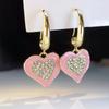 Pendientes de corazón con incrustaciones de circonita rosa, estilo viajero, superventas, nuevos y lujosos, con diamantes.