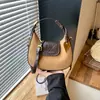 Bolsa de mão de alta qualidade transfronteiriça, nova coleção outono 2026, bolsa de ombro moderna para o dia a dia, bolsa simples e elegante estilo bolinho