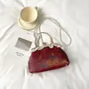 Nuevo bolso de mano bordado estilo chino de Shuai Mi, bolso elegante con cierre de cadena, bolso cruzado elegante para mujer