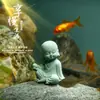 Arenito verde pequena estátua de Buda estilo chinês exibição de mesa jardim ornamental tanque de peixes paisagem boutique presente monge chá decoração de animais de estimação