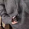 Pequeno e bonito porta-moedas de couro colar pingente feminino fone de ouvido estojo corda de couro corrente de lã acessórios longos bolsa de armazenamento