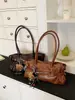 Bolsa de axila de gran capacidad para mujer, nuevo modelo 2026, bandolera retro de moda y elegante para el día a día, bolso de mano versátil de nicho