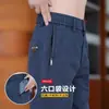 Pantalones casuales versátiles de múltiples bolsillos con cremallera al por mayor transfronterizos para hombre, estilo nuevo fino de primavera y otoño, pantalones rectos holgados de negocios para hombre