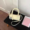 Bolso cruzado de un solo hombro de diseño único para mujer, bolso de mano simple y versátil estilo coreano, nuevo bolso de moda 2026 con lunares para el día a día