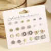 Nuevos 12 Pares Combinación Flores Morandi Trébol de Cuatro Hojas Aretes de Tachuela Mixtos Joyería para Orejas Suave Retro Femenina Venta al por Mayor Transfronteriza