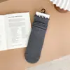 Calcetines de otoño e invierno de color marrón con borde de volantes, calcetines de color liso a media pantorrilla, calcetines holgados de estilo universitario japonés para mujer