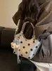 Bolsa de mano, bolso de hombro, bolsa tote, bolsa de trabajo, bolsa tipo cubo versátil, nuevo diseño de lunares de nicho estilo coreano, Primavera/Verano 2026