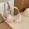 Bolsa Transversal de Ombro de Mão Feminina Nova Moda Verão 2026 Bolinhas Frescas Corrente Popular com Laço