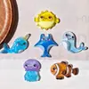 Animales marinos luminosos ballena tortuga marina accesorios de resina DIY pegamento de crema papelería hebilla de zapato material para funda de teléfono parches