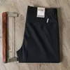 Comércio exterior verão novo cáqui Tencel algodão sarja stretch não amassa calças casuais retas slim de negócios para homens de meia-idade
