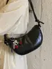 Bolsa de axila feminina de nicho transfronteiriça, novo modelo de verão 2026, simples e versátil para o dia a dia, bolsa de ombro única cruzada estilo bolinho
