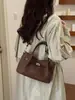 Bolso de Mano de Felpa y Gamuza para Mujer 2026 Nuevo Estilo Moderno Tacto de Alta Gama Bolso de Hombro Único Bolso Cruzado Tipo Cubo de Felpa y Gamuza Exquisito