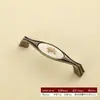 Alça de Cerâmica Estilo Europeu Liga de Zinco Moderno Simples Armário Guarda-roupa Porta Infantil Redonda Furo Único Alça Antiga Alça