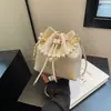 Bolso de Estilo Nacional Chino Nuevo para Mujer 2024 Nuevo Bolso de Cubo Portátil de Moda con Perlas Estilo Occidental Combinable Bolso de Hombro Cruzado