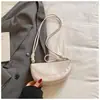 2026 Verano Nuevo Bolso Casual de Hombro Cruzado Texturizado Simple Forma de Croissant Alta Apariencia Bolso de Axila