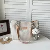 Bolsos de nicho versátiles y elegantes: Bolsos tote de gran capacidad para el día a día 2026, bolsos casuales para mujer de alta gama y a la moda