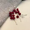 Aretes de Bola de Pelo con Lazo Rojo Ankora para Nochevieja, Exquisitos Retro, Simples, de Gama Alta y Versátiles, Pendientes Elegantes